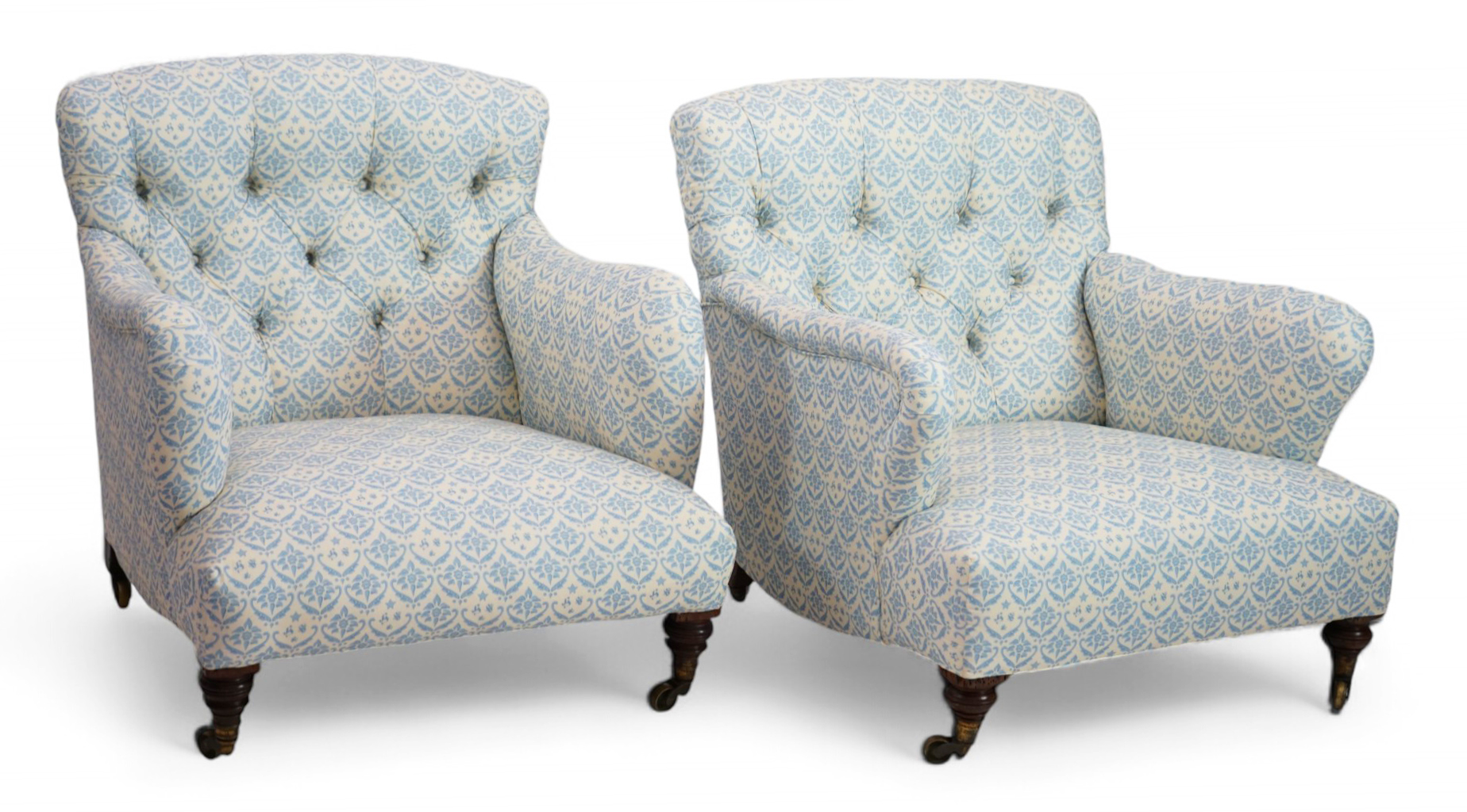 A Victorian Howard & Sons Bridgewater armchair and a similar Victorian armchair